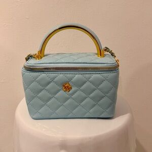 Elegant Blue Quilted Handbag with Gold Details